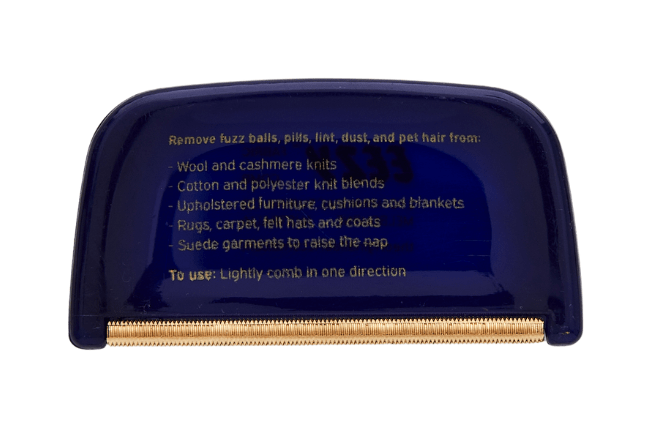 Back of EEZY™ Fabric Comb showing how to use instructions. Lightly comb in one direction. Remove fuzz balls, pills, lint, dust, and pet hair from wool and cashmere knits; cotton and polyester blends; upholstered furniture cushions and blankets; rugs carpets felt hats and coats; suede garments to raise the nap.